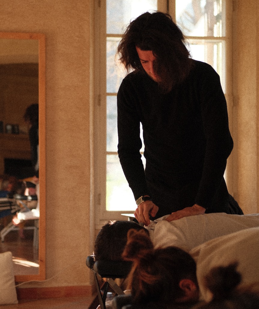 Dr. Alexis Robic performing chiropractic treatment